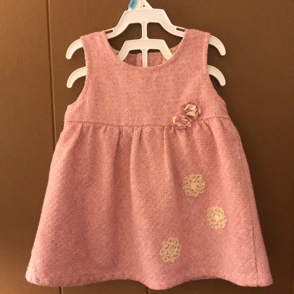 Pink thick dress with flower decoration